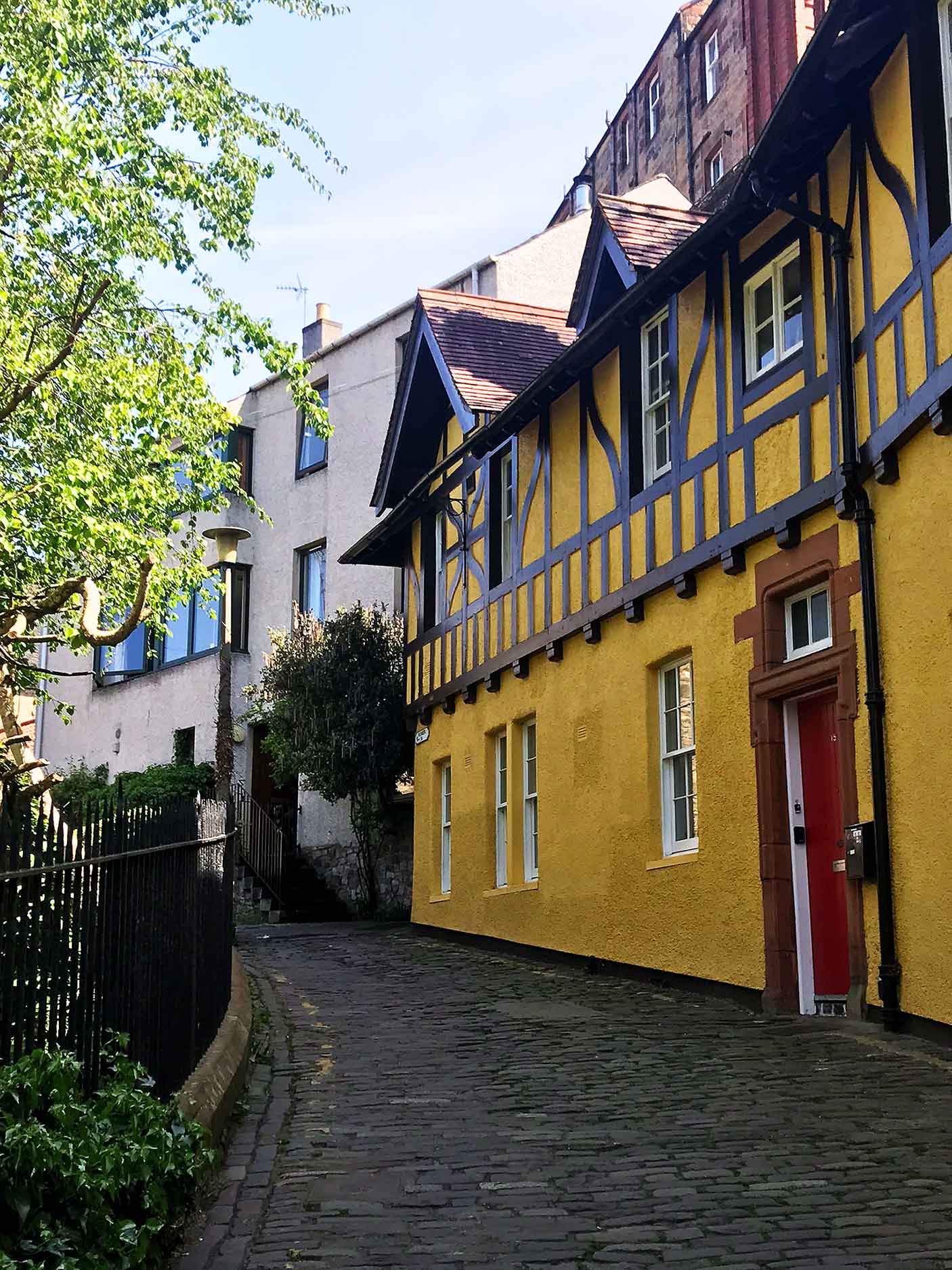 old yellow row homes in dean village edinburgh