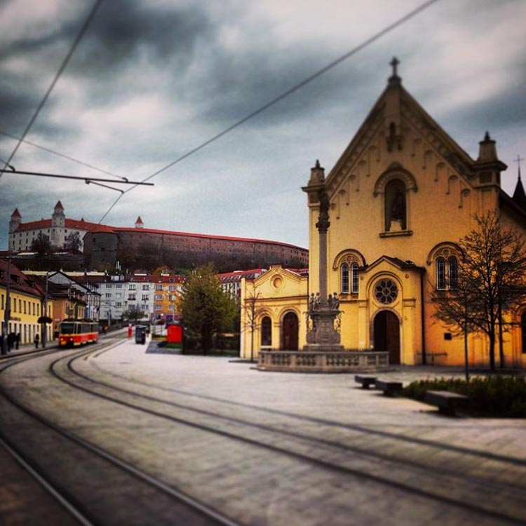 Yellow church in Bratislava, Slovakia, a city of my list of hidden gems in Europe.