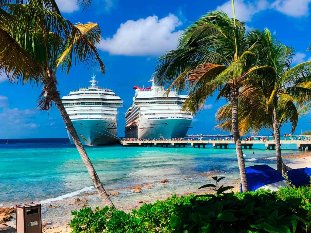 Cruise ships docked in Turks & Caicos, one of the lesser visited Caribbean beach vacation destinations