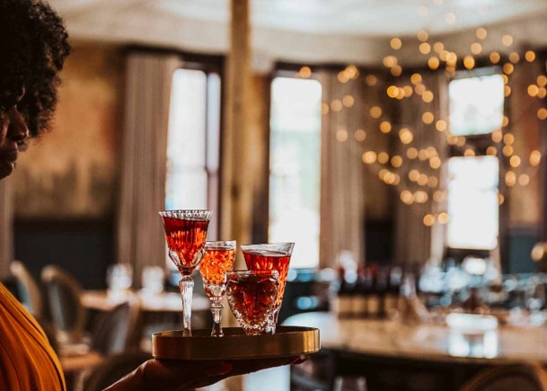 Server with Amara aperitifs at Lazia, one of the best restaurants in Kansas City