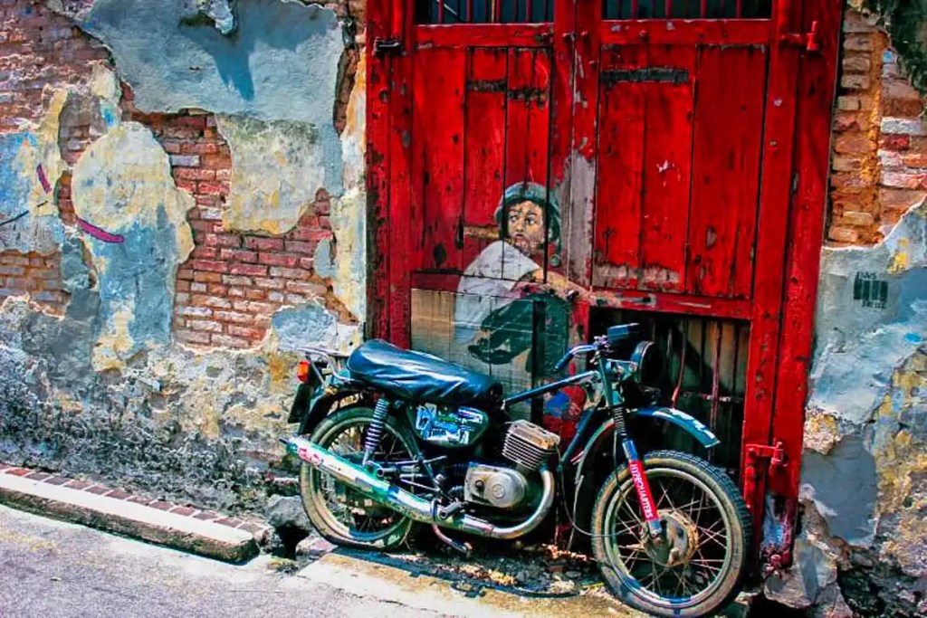 Penang street art "Boy On A Bike"