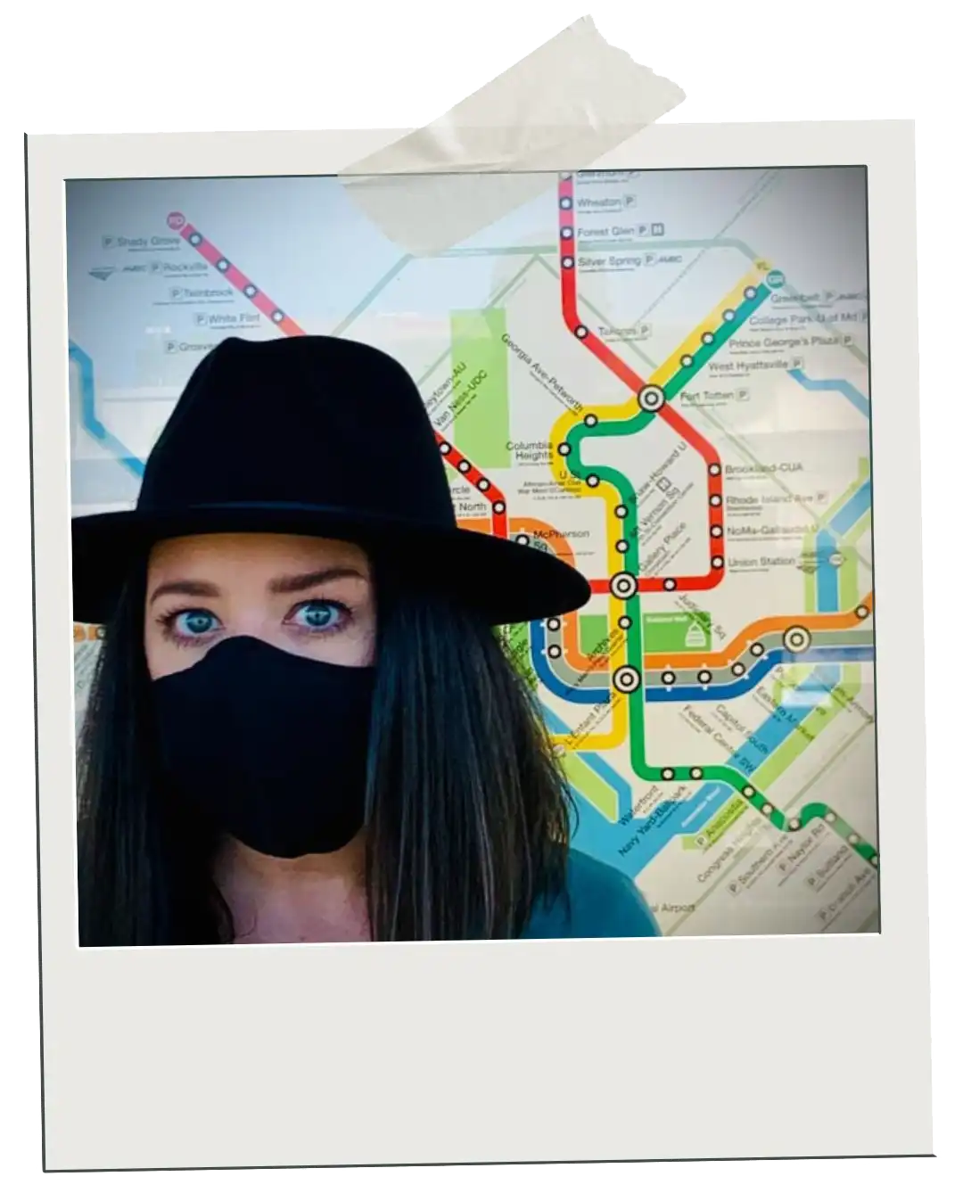 Itineraries polaroid of Jordan with a face mask on standing in front of a DC Metro map