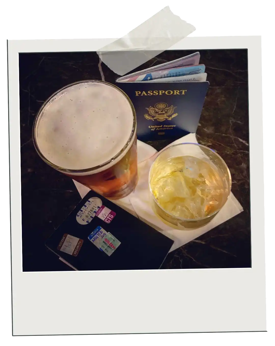 Search Global Debauchery polaroid of alcoholic beverages and passports